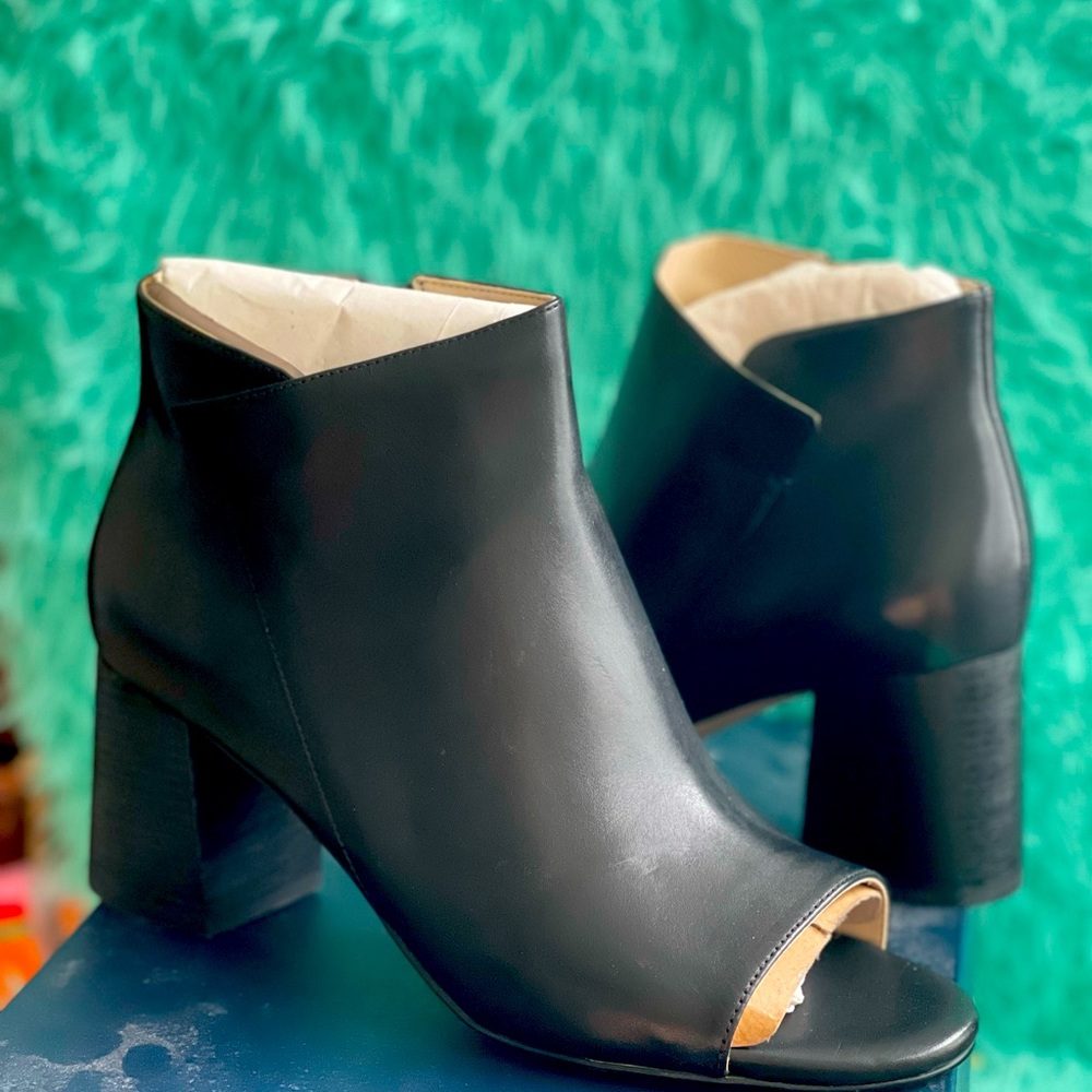 Black Leather bootie. New in box